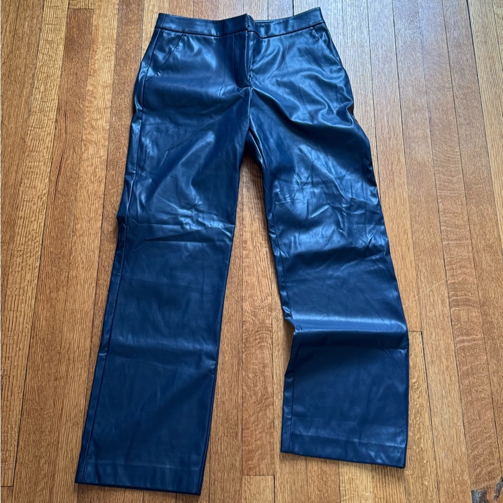 Never been worn dark blue leather trousers